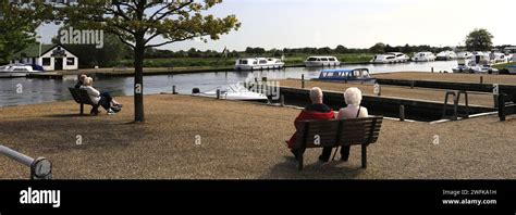 Summer View Over Boats At Potter Heigham Village River Thurne Norfolk