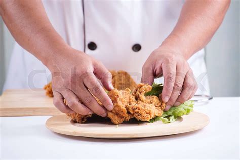 chef cook preparing fried chicken stock image colourbox
