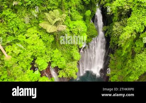 Aerial Drone Of Waterfall In The Green Forest Tinago Falls In The