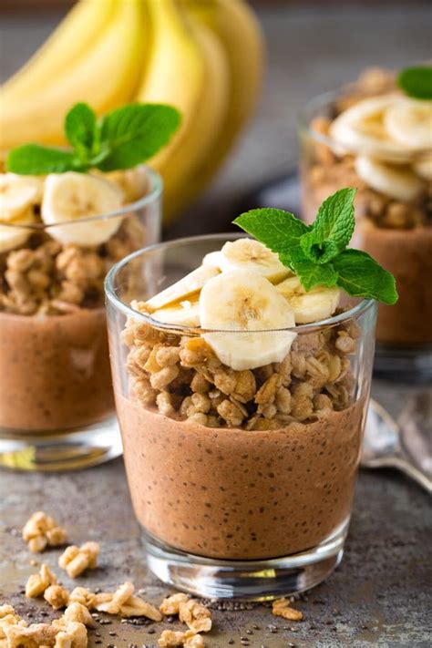 Layered Chocolate Chia Pudding Parfait With Banana Granola And Yogurt