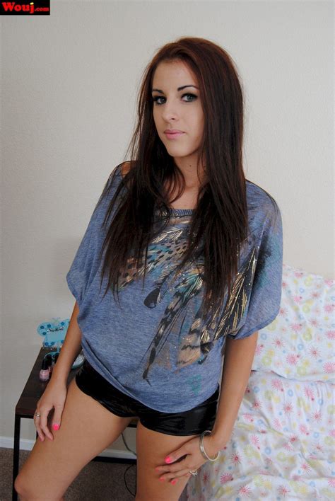 Girl In Latex Shorts Lifts Up Her Shirt And Shows Her Tits Photos
