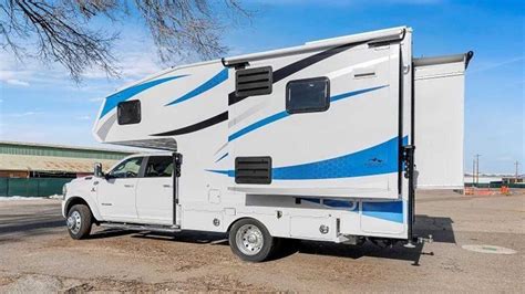 Massive Truck Camper Has Three Slide-Out Sections And…