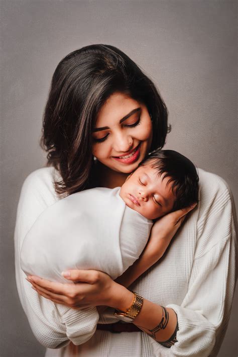 Mother And Newborn Baby Photography