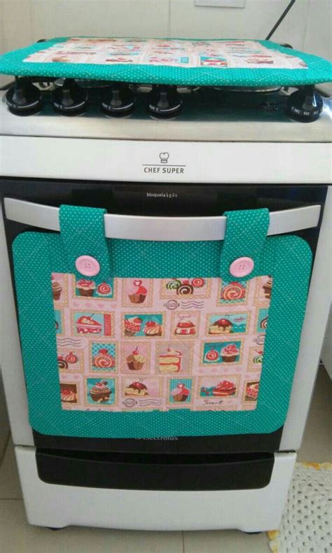 A Stove Top Oven Sitting Inside Of A Kitchen Next To A White Tiled