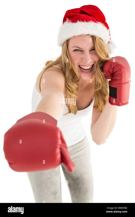 Festive Blonde Punching With Boxing Gloves On White Background Stock