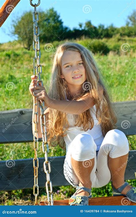 Eight Years Old Boy Sitting On Dad S Shoulders Both In Swimming Shorts