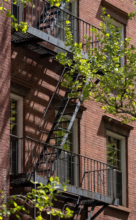 Fire escape on apartment building Stock Photo | Adobe Stock