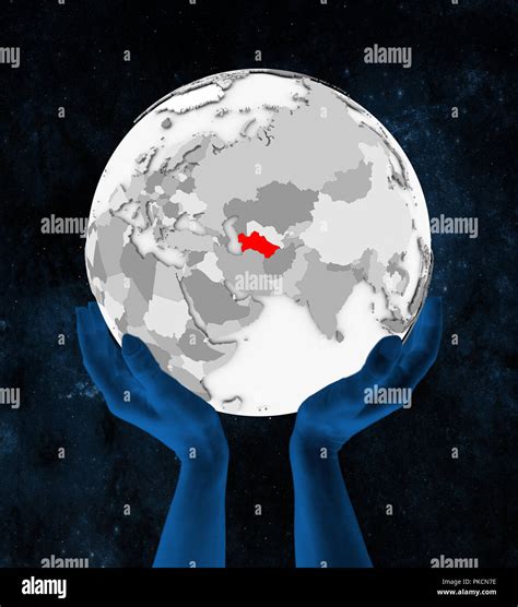 Turkmenistan In Red On White Globe Held In Hands In Space 3D