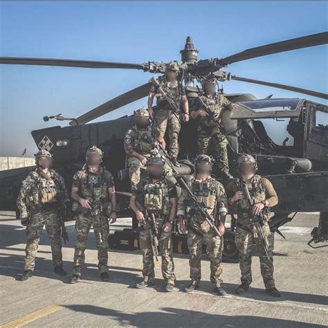 Members of a U.S. Army Special Forces ODA pose with an Apache attack helicopter [828 x 828] : r ...