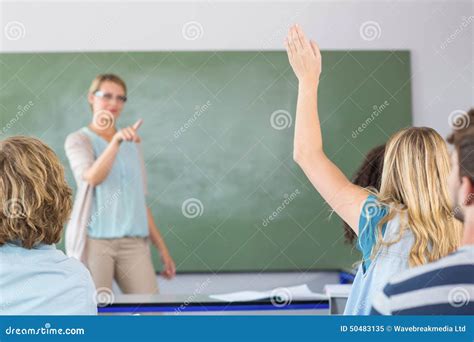 Student Raising Hand in Classroom Stock Image - Image of learning ...