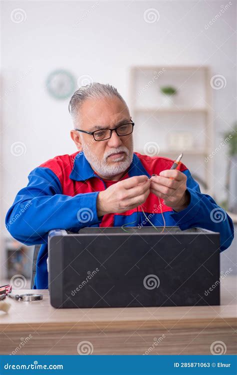 Old Male Repairman Repairing Computer Stock Image Image Of