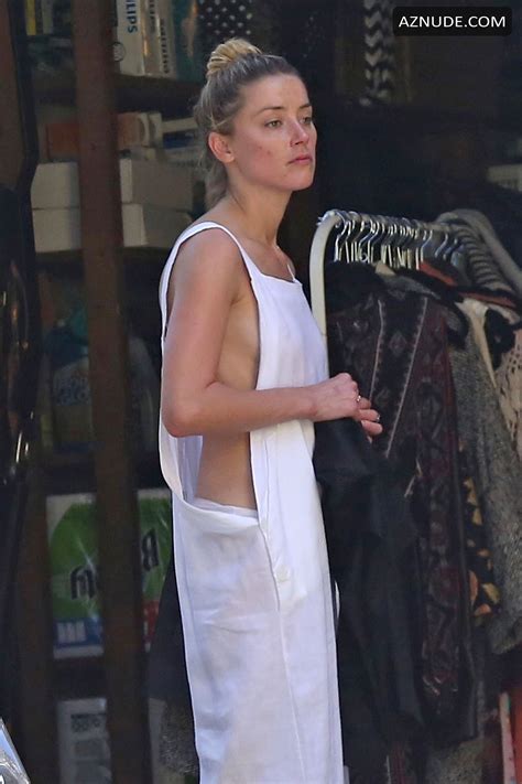 Amber Heard Nip Slip Exposes Boob While Cleaning Out Her Garage In La