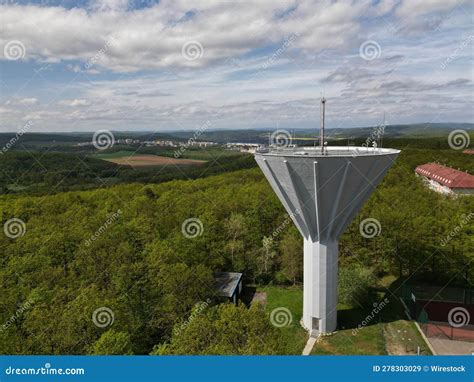 An Aerial View Of A Water Tower That Sits Over Trees Stock Image