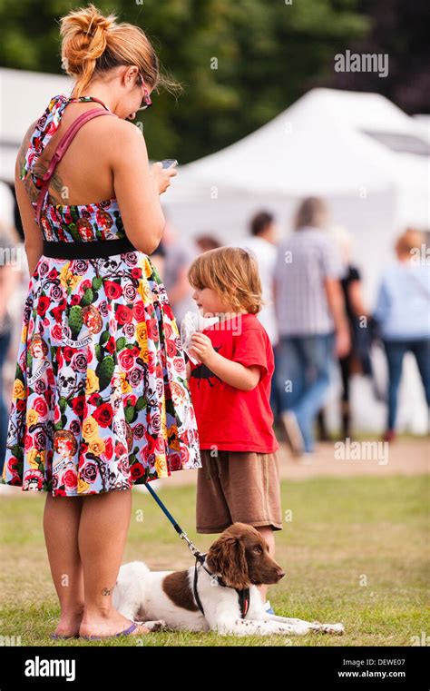 A Woman With Her Dog At The All About Dogs Show At The Norfolk