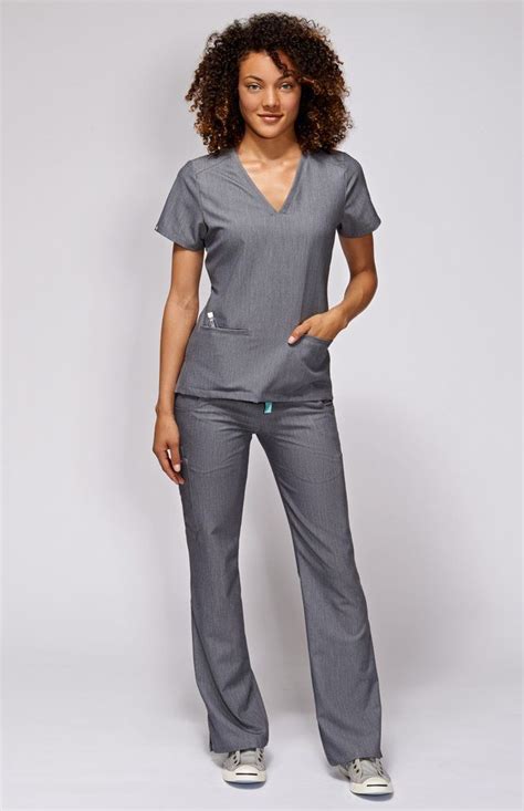 With Stretch Fabric And Three Pockets The Women S Casma Scrub Top Is