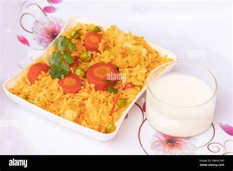 Basmati Rice Vegetable Pulao Served In Plate With Curd Stock Photo Alamy