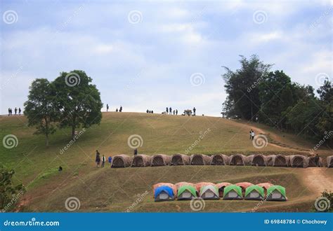 Backpacker Tents With Green Hills And Mountains Landscape Stock Photo