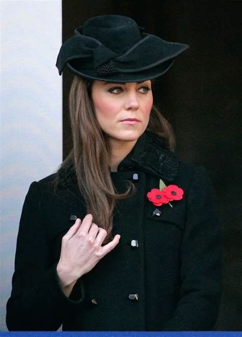 Why Kate Middleton And The Queen Wear Multiple Poppies On Remembrance