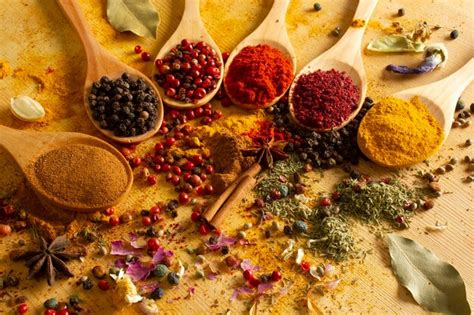 Premium Photo Various Spices In Wooden Spoons