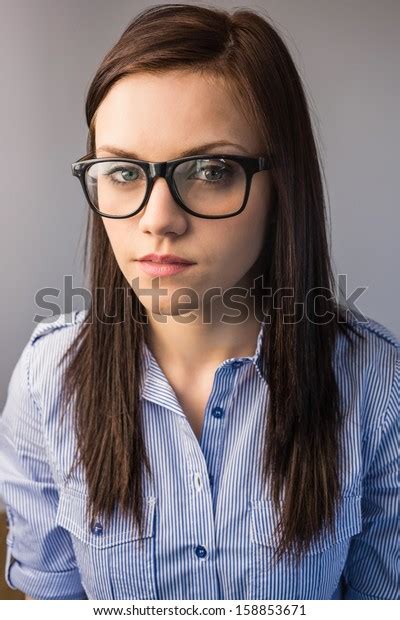 Serious Pretty Brunette Wearing Glasses Posing Stock Photo Shutterstock