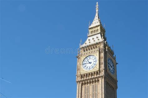 Big Ben Clock Tower Close Up In London On The Blue Sky Symbol Of