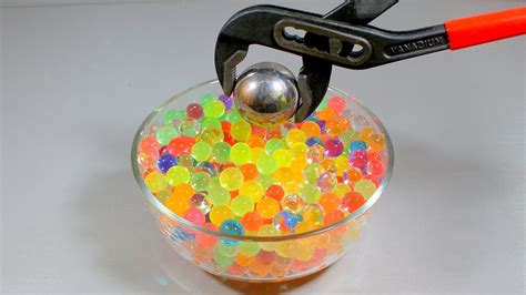 EXPERIMENT Glowing 700 Degree Metal Ball VS Orbeez Balls YouTube