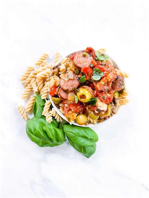 Sun Dried Tomato Pasta With Chicken Sausage And Capers Entirely Emmy