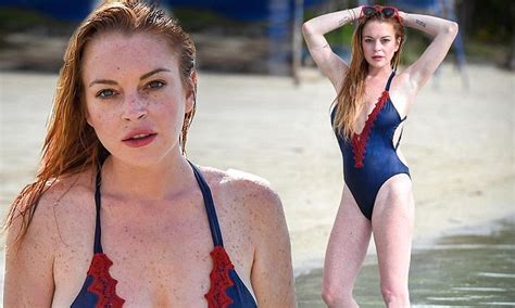 Lindsay Lohan Puts On An Extremely Busty Display In Plunging Blue Swimsuit In Mauritius Daily