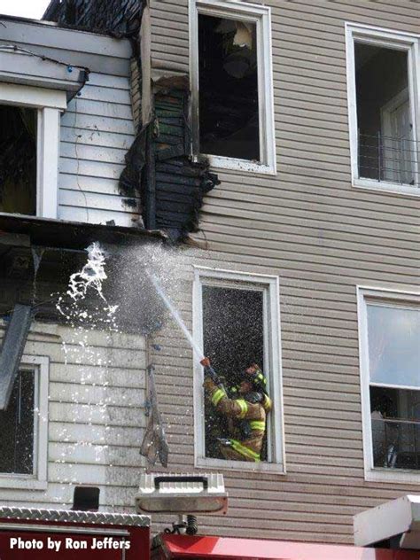 Jersey City NJ Firefighters Battle Fire That Burns Through Two