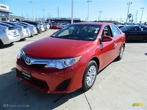 2012 Barcelona Red Metallic Toyota Camry Le 57874720