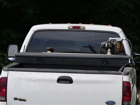 Truck Bed Fuel Tanks Easily Expand Poor Towing Range And Save Money