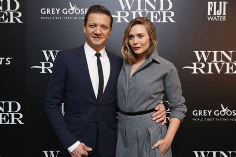 Elizabeth Olsen Jeremy Renner At Wind River Screening