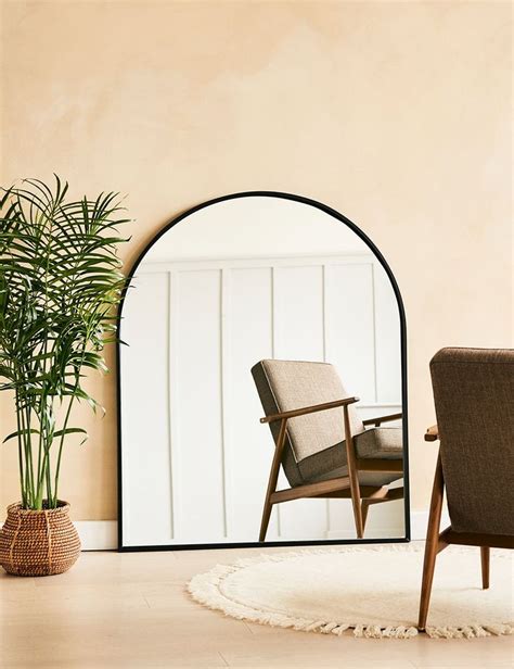 This Stylish Black Framed Arch Shaped Mirror Is Perfect For Introducing