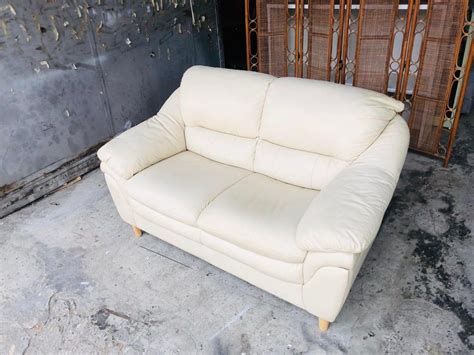 Cream leather luxury sofa on Carousell