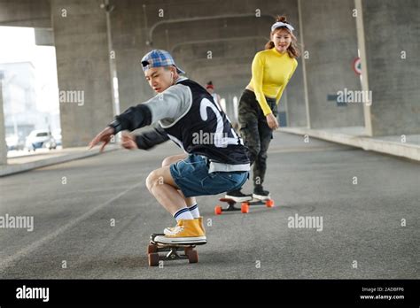 Young People Skateboarding Stock Photo Alamy