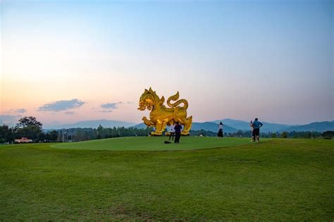 Premium Photo A Beautiful View Of Golden Singha Statue In Singha Park