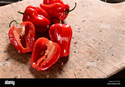 Fresh Habanero Peppers On Wooden Background Stock Photo Alamy