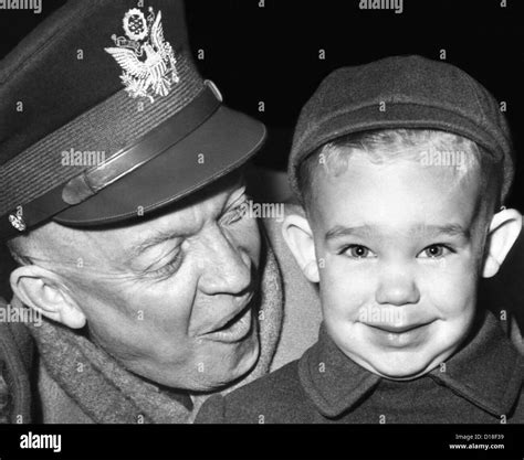 General Dwight Eisenhower with his three year old grandson, Dwight ...