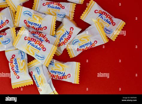 Campino boiled sweets, fruit and yogurt flavours, red background Stock Photo - Alamy