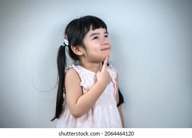 Portrait Young Cute Girl Thinking Pose Stock Photo 2064464120 | Shutterstock