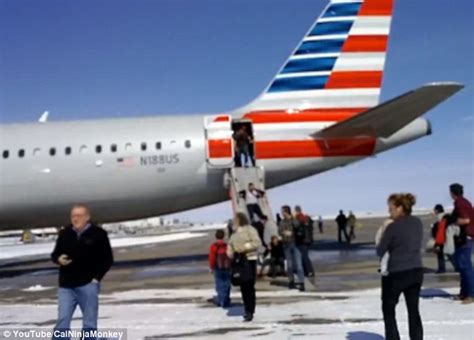 American Airlines Passengers Use Emergency Slides As Smoke Fills Cabin In Denver Daily Mail Online