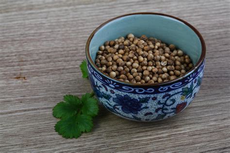 Coriander seeds dish view 12843591 Stock Photo at Vecteezy