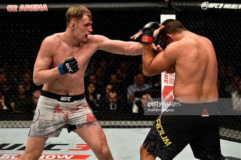 Alexander Volkov Of Russia Punches Fabricio Werdum Of Brazil In Their