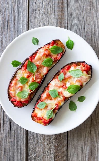 Premium Photo Baked Eggplant With Cheese Mozzarella Tomatoes And