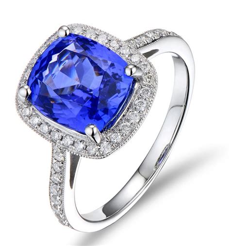 Antique 150 Carat Cushion Cut Sapphire And Diamond Halo Engagement Ring In White Gold Jeenjewels