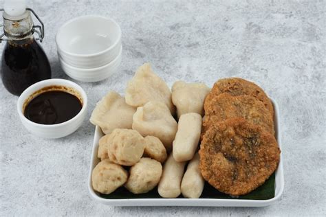 Premium Photo Pempekis A Savoury Indonesian Fishcake Delicacy Made Of