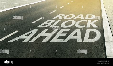Road block ahead message on the highway lane, traffic signs and ...