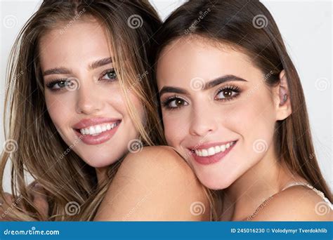 Women Face Of Two Girls Close Up Natural Beauty And Skincare Concept