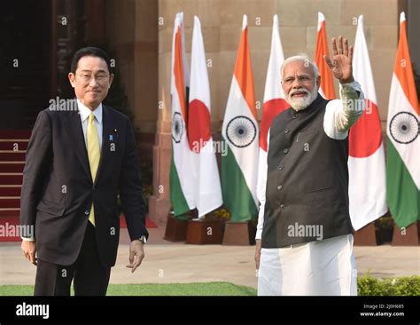 Indian Prime Minister Narendra Modi Greets His Japanese Counterpart