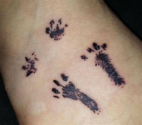 Pin By Torie Story On Bunny S Wish List Paw Print Tattoo Tattoos My Style